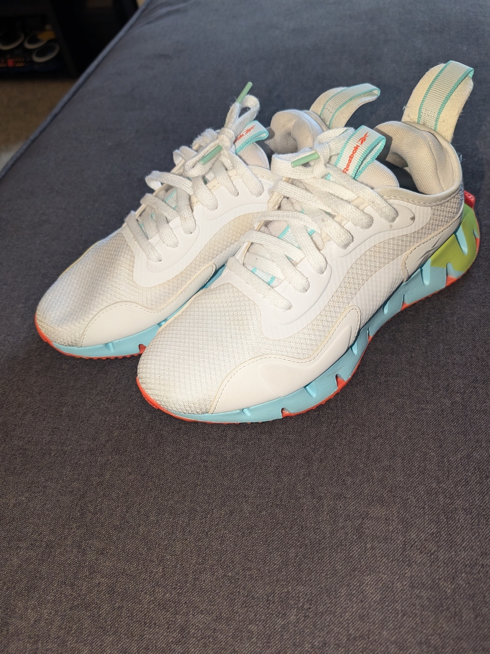 Reebok Lightweight White Sneakers with Aqua and Coral Accents